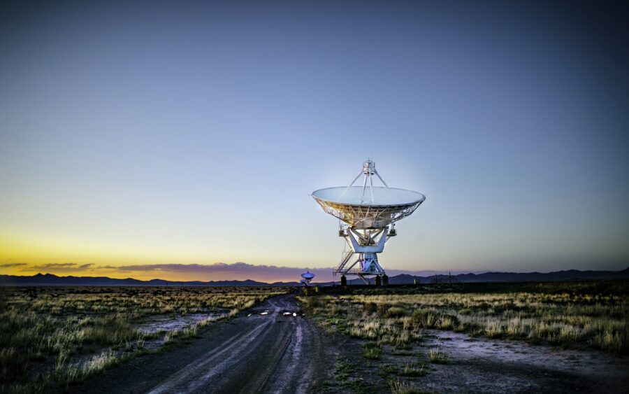 A radio telescope dish at dusk